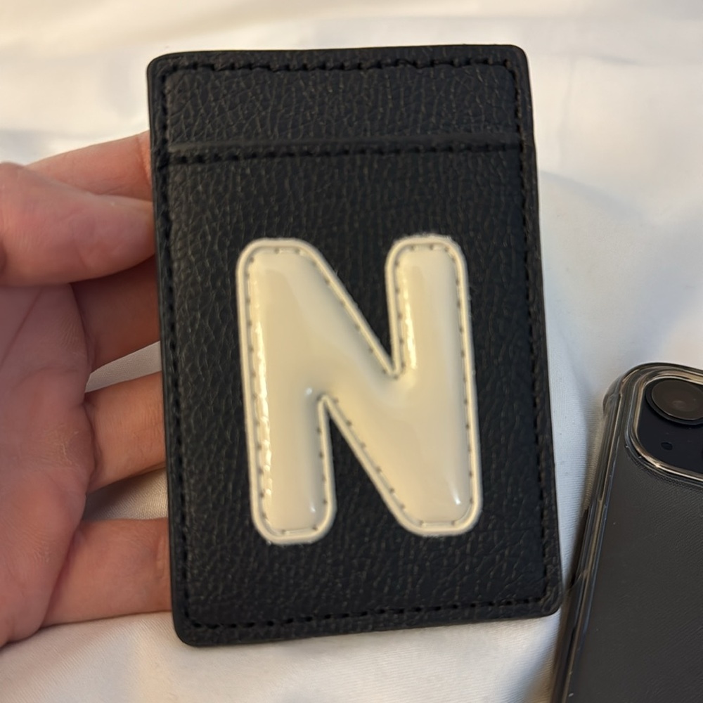 N leather wallet ￼- 3M sticky back for phone